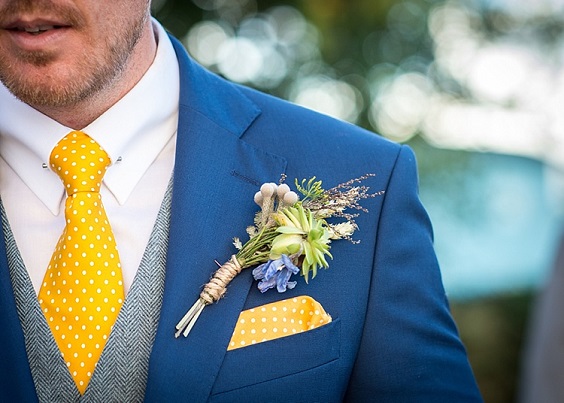boutonniere and yellow pocket square