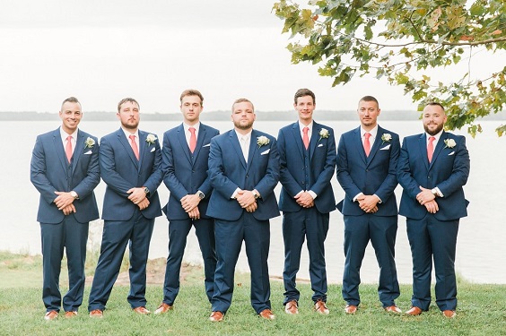 navy blue men suits with coral tie for navy blue and coral wedding color beach