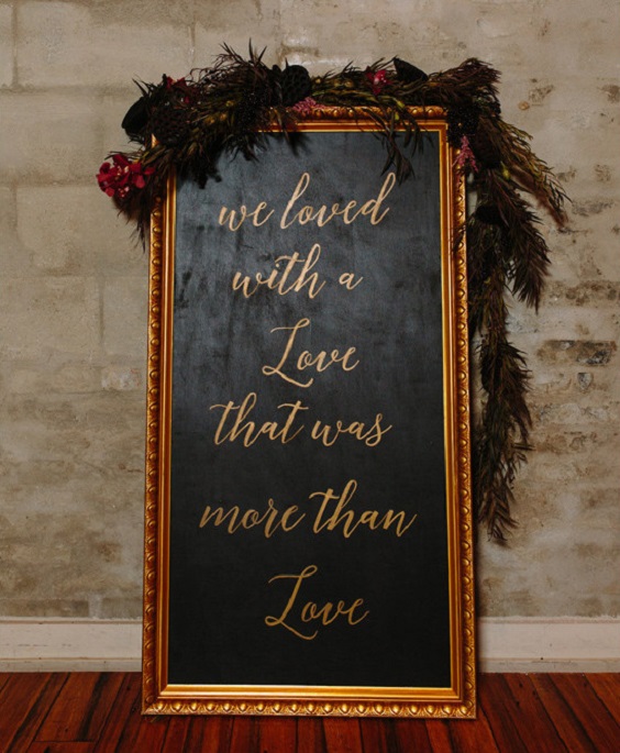 black and gold welcome sign for rustic goth black and gold wedding