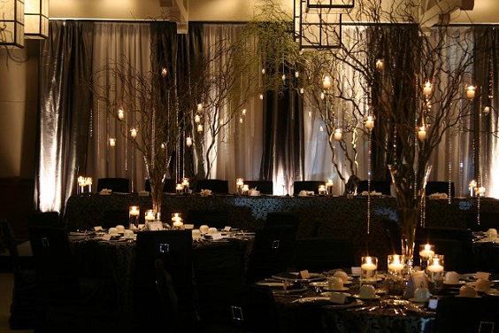 black chairs gold table centerpiece for rustic goth black and gold wedding