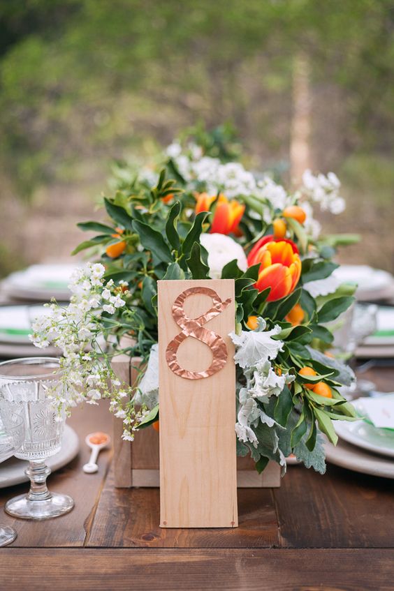 flower centerpiece for summer wedding in country barn