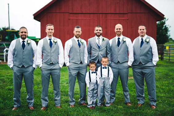 grey mens suit for summer wedding in country barn