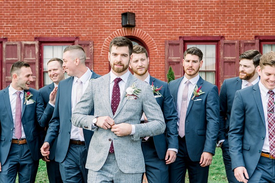 grey and navy mens suit for spring wedding in country barn