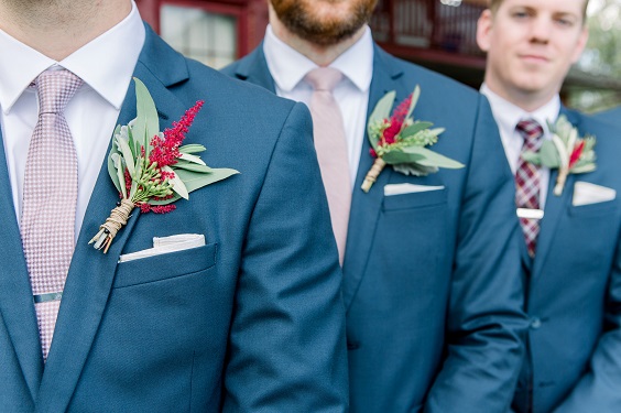 navy mens suit and boutonniere for spring wedding in country barn