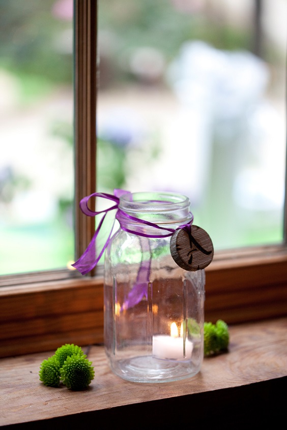 glass jar for purple and white wedding in country barn
