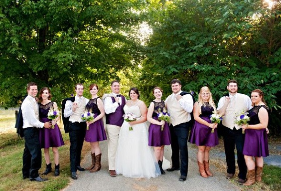 purple bridesmaid dresses and white mens suit for purple and white wedding in country barn