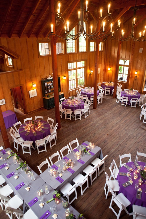 purple tablecloth and white wedding chairs for purple and white wedding in country barn