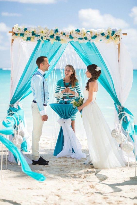 aqua wedding ceremony arch and chair decorations for mint and aqua simple beach wedding