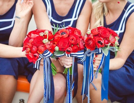 blue beidesmaid dresses with red wedding bouquets for red and blue simple beach wedding