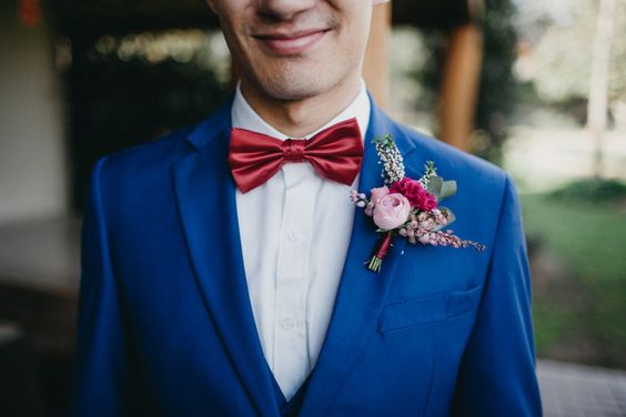 blue wedding men suit and red bow tie for red and blue simple beach wedding
