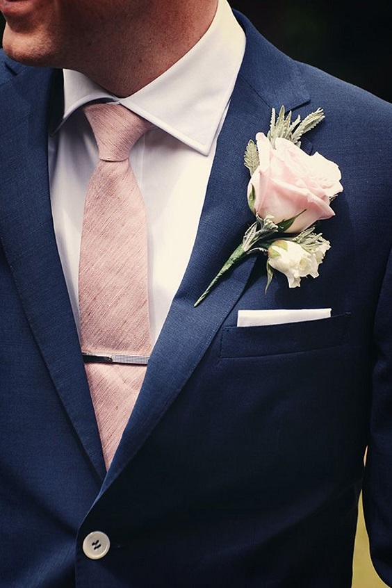 navy blue mens suit with blush tie and boutonniere for rustic outdoor wedding colors navy blue and blush