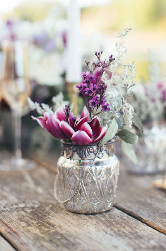 silver bottle with plum flowers for rustic outdoor wedding colors plum lilac and green