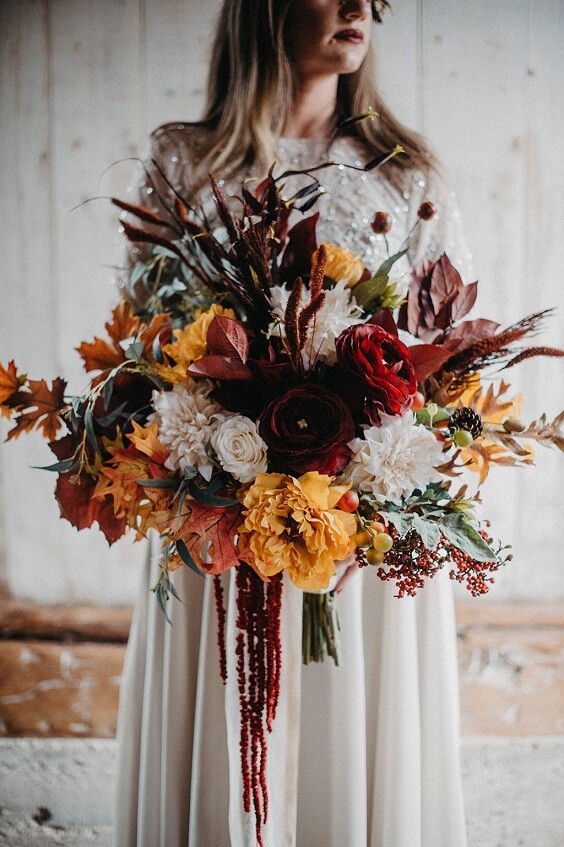 burgundy white and yellow bouquet for rustic outdoor wedding colors sunset