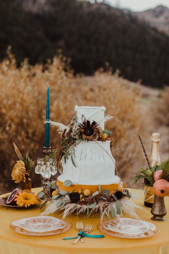 white and mustard wedding cake for rustic outdoor wedding colors teal and mustard