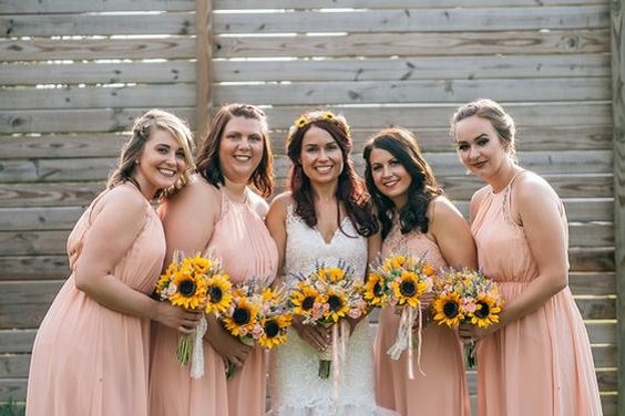 peach bridesmaid dresses sunflower bouquets for sunflower and rose wedding sunflower and peach rose