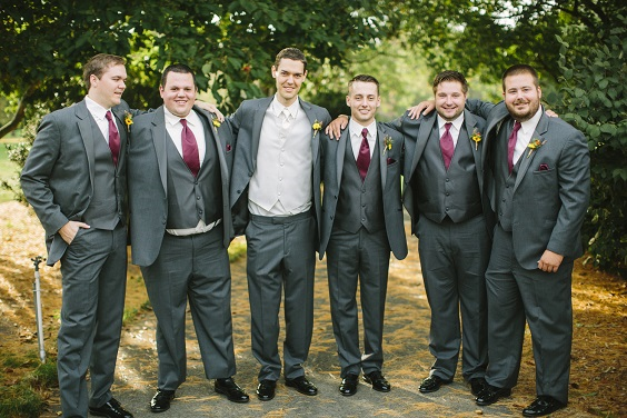 grey men suit with burgundy tie for sunflower and rose wedding sunflower and burgundy rose