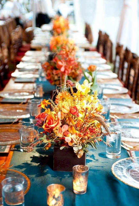 teal wedding table cloth and orange centerpieces for teal and orange country chic wedding