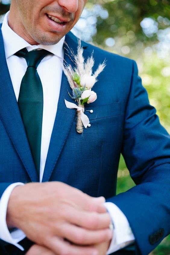 blush boutonniere blue men suit for blush blue outdoor october wedding
