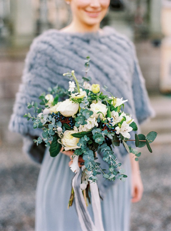 dusty blue bridesmaid dresses and green bouquets for dusty blue green outdoor winter wedding