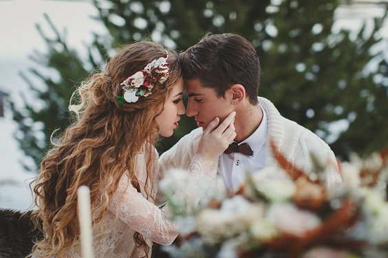 white bohemian bridal gown for white outdor winter wedding