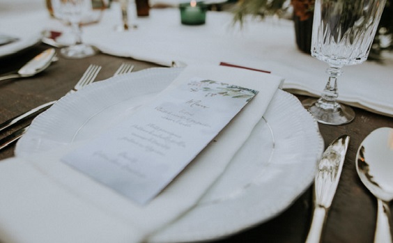 white wedding stationery and dinner plate for white outdoor winter wedding