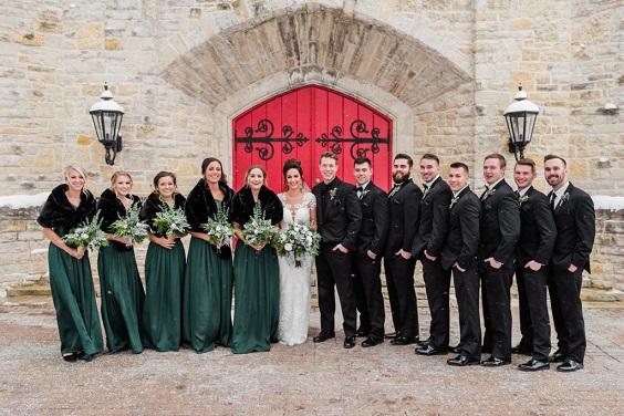 black groomsmen suits emerald green bridesmaid dresses with black shawl for winter wonderland wedding color emerald green and black
