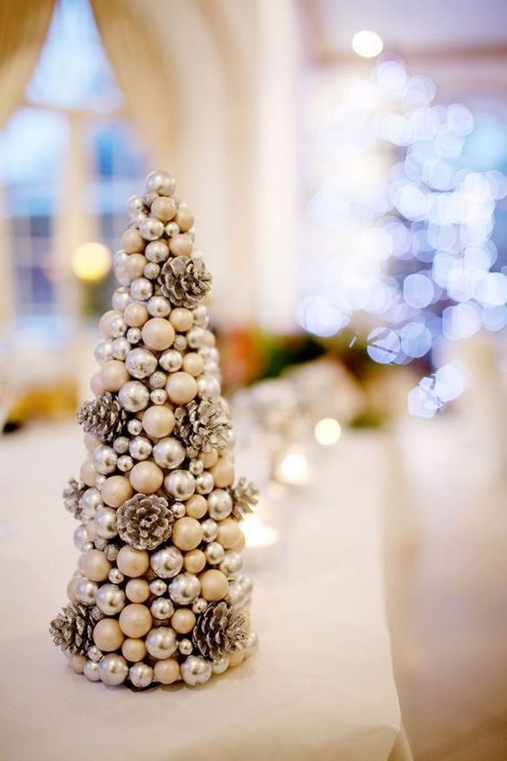 gold and brown beads pearls and pinecones christmas tree wedding centerpiece for winter wonderland wedding color gold and brown