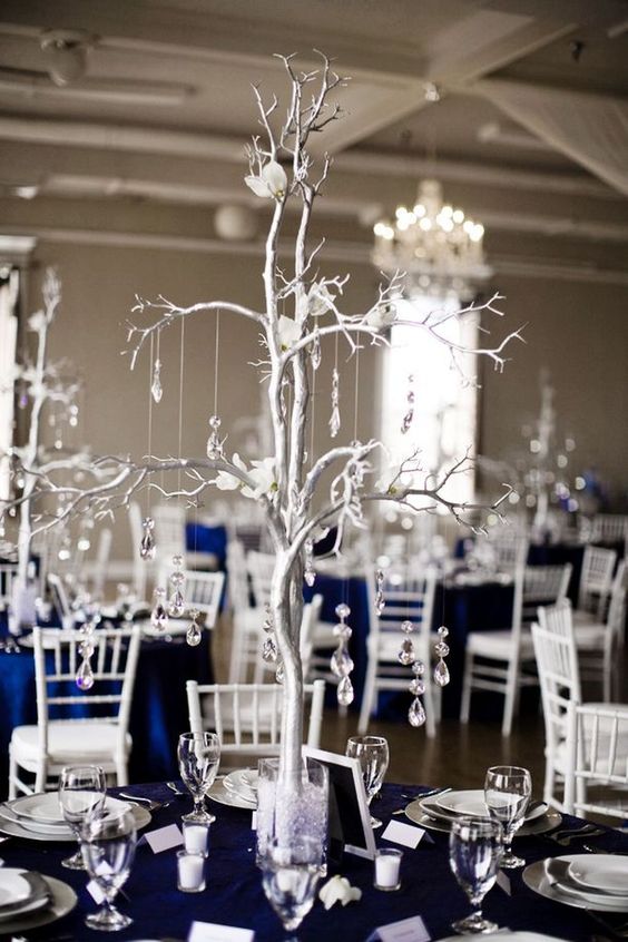 navy blue wedding tablecloth and grey tree branch chandelier table décor for winter wonderland wedding color navy blue and grey