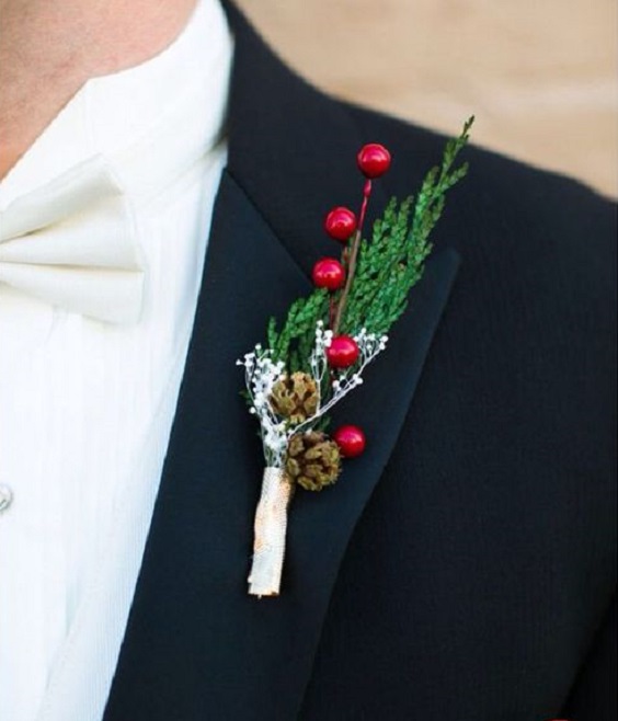 navy men suit with red cranberry boutonniere for winter wonderland wedding color red and navy