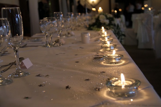 silver candle wedding table decoration for winter wonderland wedding color grey and silver