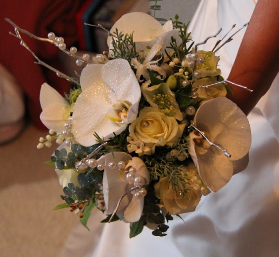 white and pale yellow flower bouquet with branches decoration for winter wonderland wedding color grey and silver