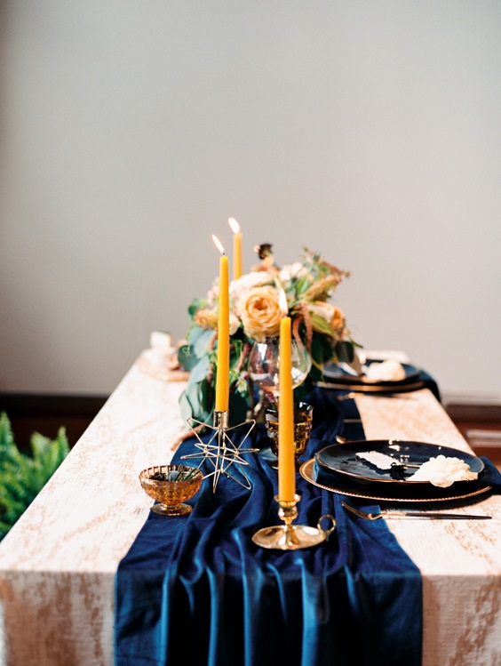 blue table runner yellow candles for spring blue and yellow wedding