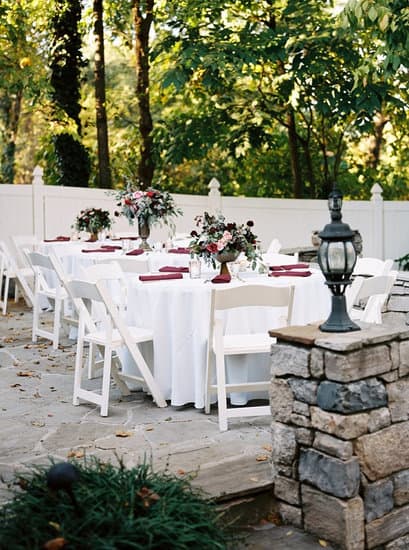 burgundy table cloth and white wedding chairs for white burgundy rose gold and burgundy wedding