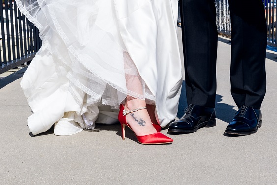 white wedding dress and red shoes for classic red and white wedding