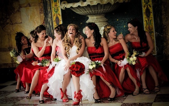 white wedding dress and red bridesmaid dresses for gold red and white wedding