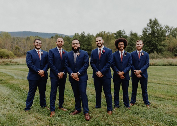navy blue groomsmen and groom men suit with burgundy tie for burgundy and navy wedding color burgundy navy and rose gold