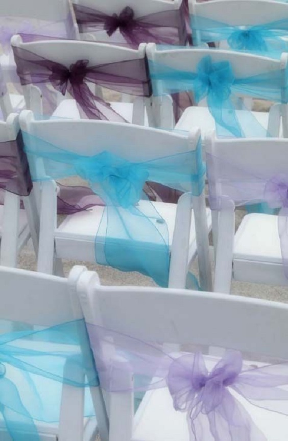 teal and purple chair decoration for beach teal and purple wedding