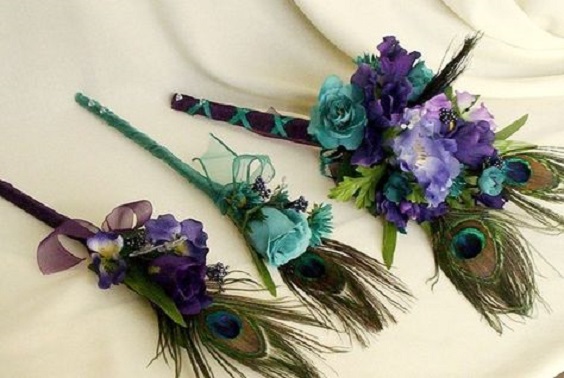 teal and purple boutonniere for peacock teal and purple wedding