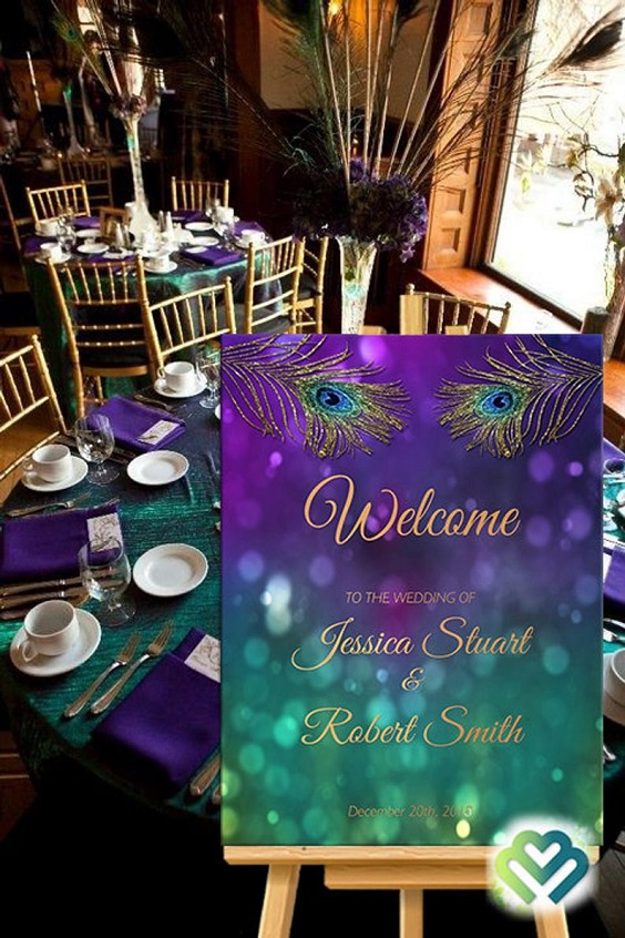 teal and purple welcome sign for peacock teal and purple wedding