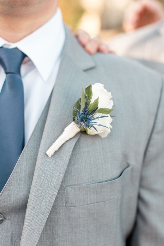 blue mens tie and boutonniere for blue mauve and grey wedding